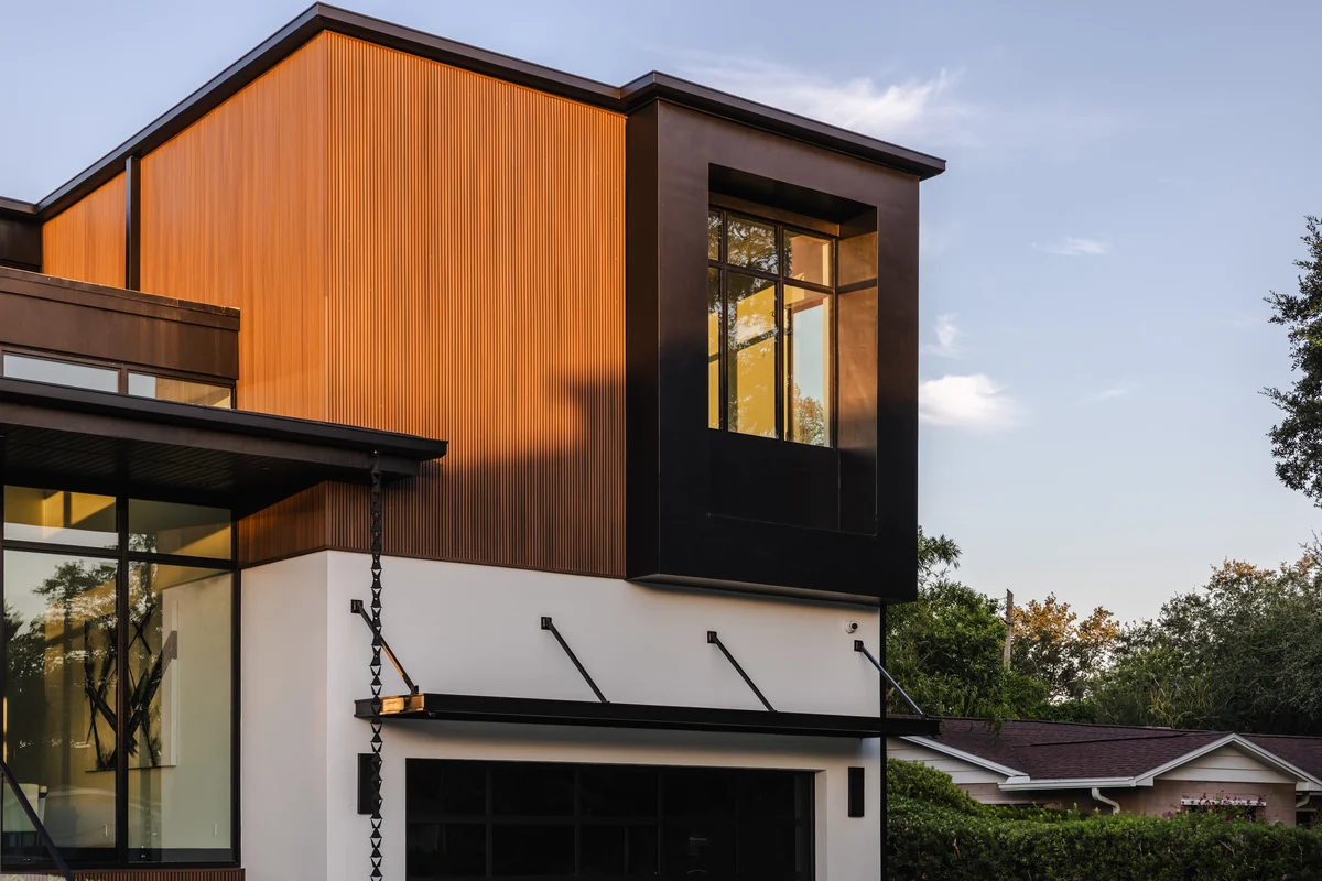 Upper-level glazing and vertical cladding at Skyward